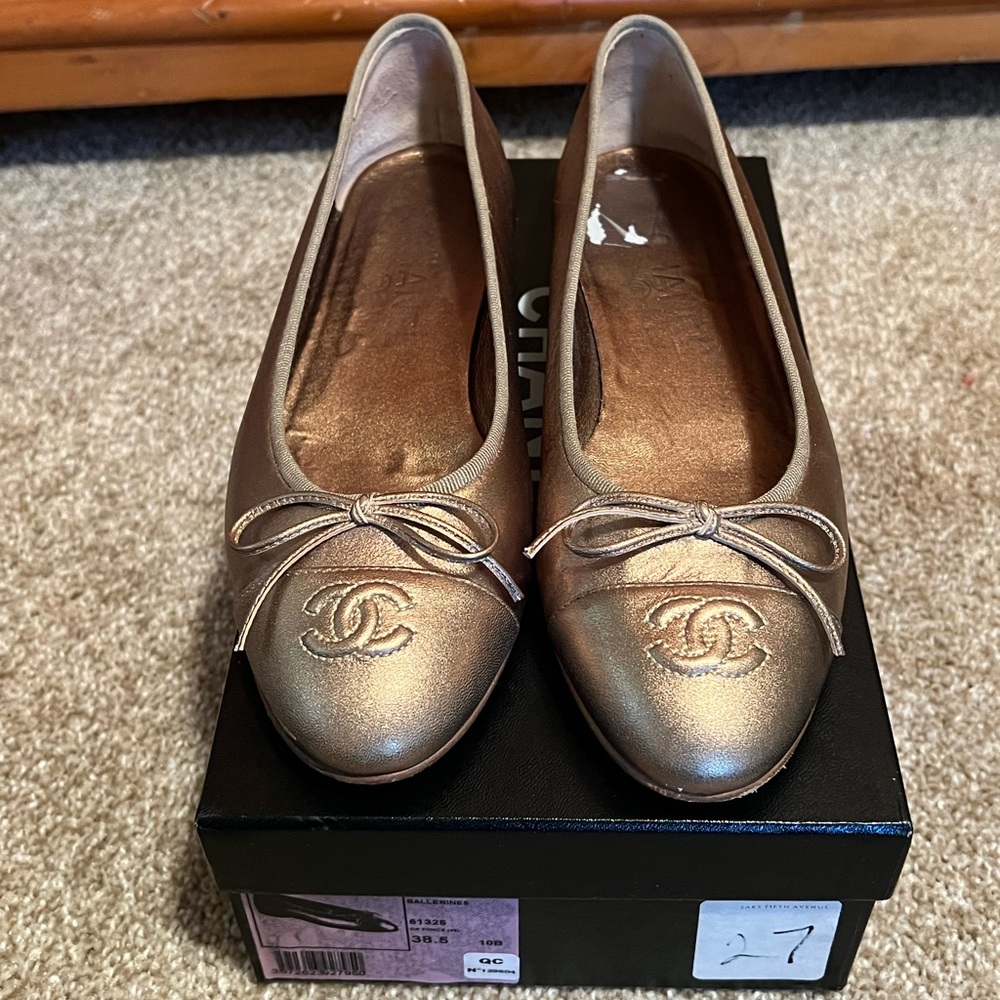 Chanel gold ballerinas